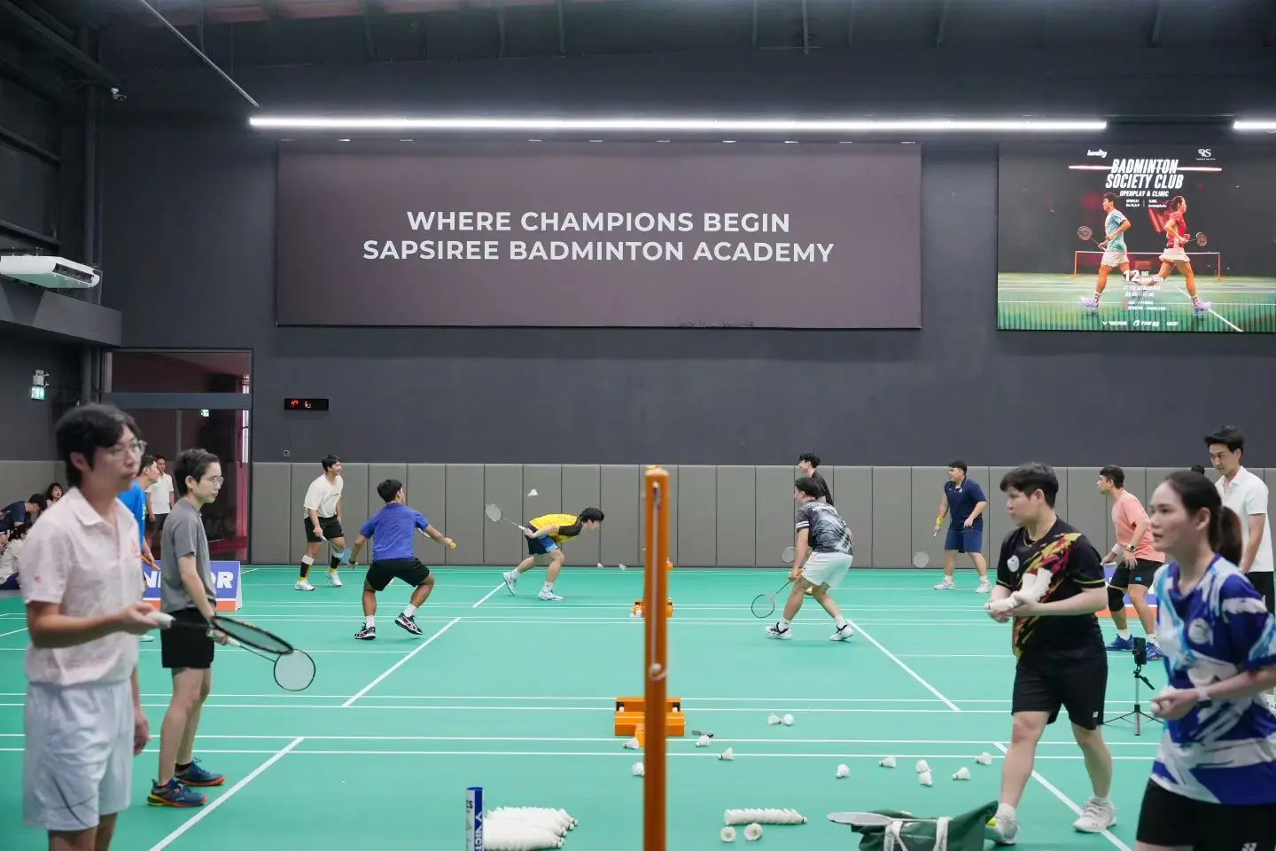 Players training inside Sapsiree Badminton Academy in Bangkok